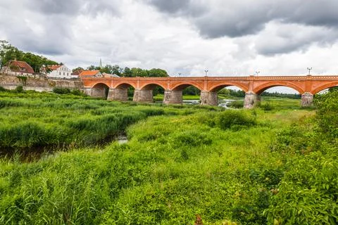 The old brick bridge across the Venta in Kuldiga, Latvia Stock Photos