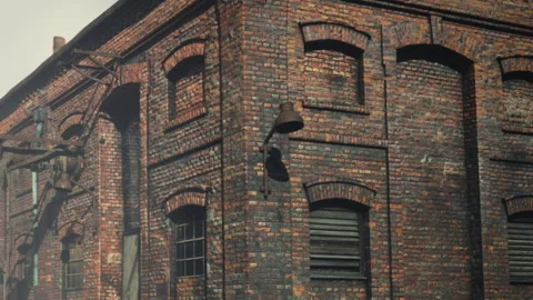 Old brick building with industrial design in daytime light Stock Footage 340627293
