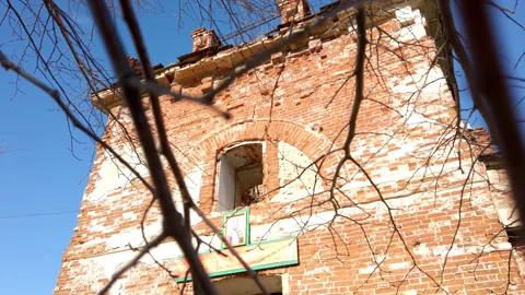 Old Brick Building Seen Through Branches Stock Footage 275202360