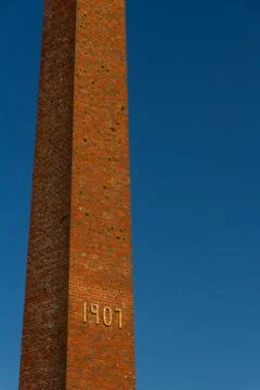 Old brick chimney with 1907 Stock Photos