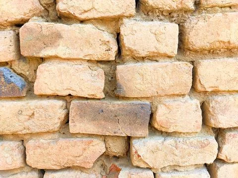 Old brick clay wall texture Stock Photos