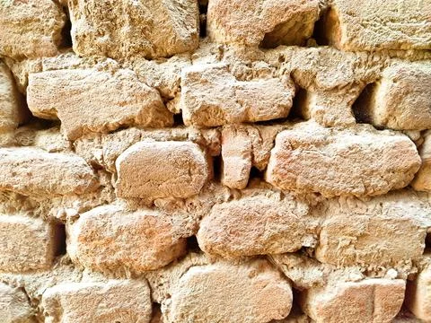 Old brick clay wall texture background Stock Photos