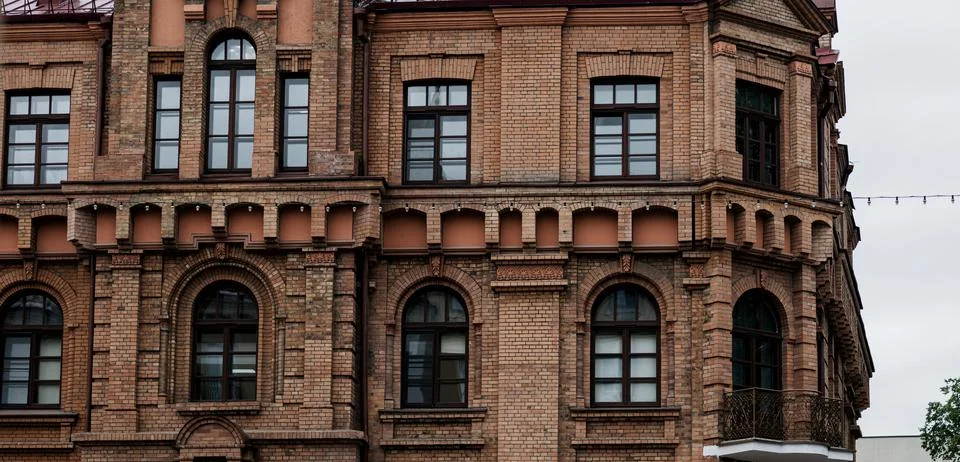 Old brick house with windows. Stock Photos