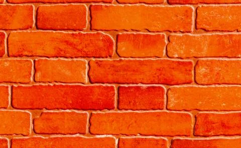 Old brick placed in the wall, interesting and original background 스톡 사진