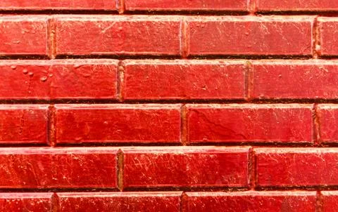 Old brick placed in the wall, interesting and original background 스톡 사진