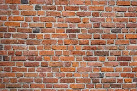 Old brick side wall of St. John's Archcathedral in the Warsaw Old Town Stock Photos