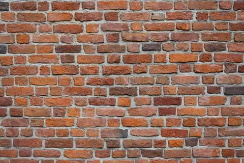 Old brick side wall of St. John's Archcathedral in the Warsaw Old Town Stock Photos