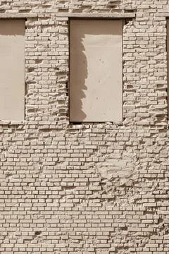 Old brick textured surface of beige color Stock Photos