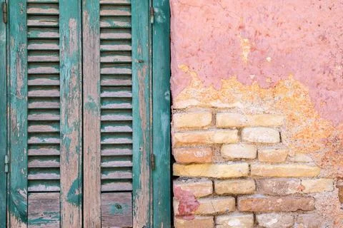 Old brick a wall and window with shutter Foto stock