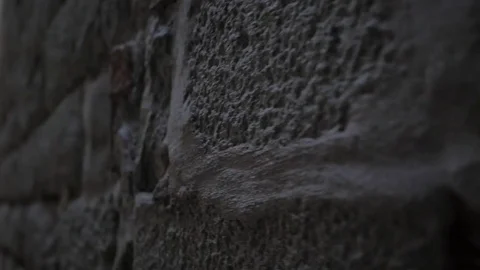 The old brick wall background. Ancient building in gothic quarter of Barcelona Stock Footage 81262604