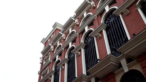 Old brick wall background building  on cloudy background. Footage. Stock-Footage 128123640