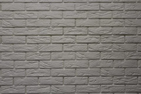 Old brick wall background. Grunge texture. Black wallpaper. Stock Photos