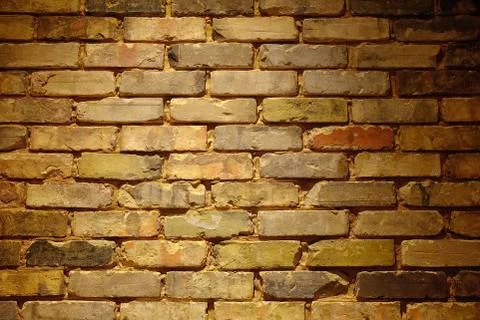 Old Brick Wall Background with Light Leak. Stockfoto's
