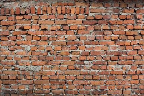 Old brick wall background. The loft-style. Brickwork Wallpaper and background Stock Photos