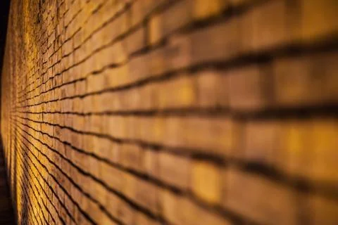Old brick wall background night time Stock Photos