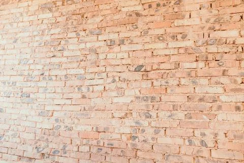 Old brick wall for background. Orange brick wall, under construction Stockfoto's