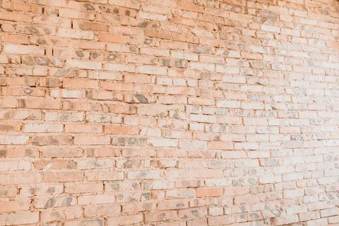 Old brick wall for background. Orange brick wall, under construction Stockfoto's