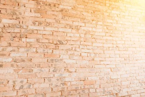Old brick wall for background. Orange brick wall, under construction Stockfoto's