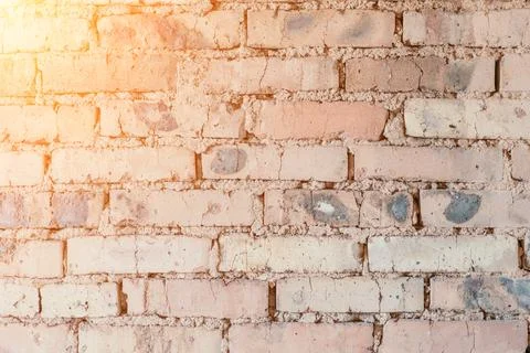 Old brick wall for background. Orange brick wall, under construction Stockfoto's