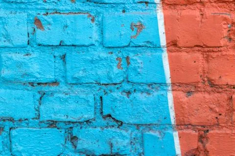 Old brick wall background texture with smudges and cracks painted in red and  Stock Photos