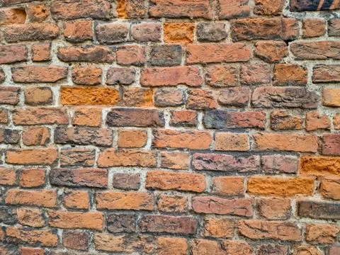 Old brick wall background. texture of a brick wall Stock Photos