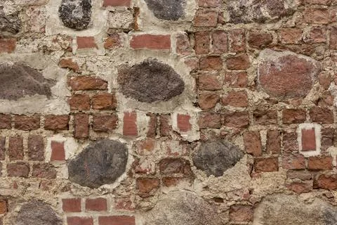 Old brick wall. Brickwork from an old brick in a rustic style. The structure  Foto stock