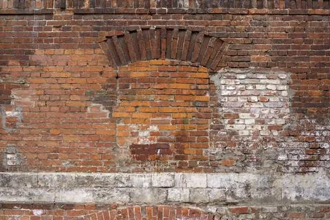 Old brick wall. Brickwork from an old brick in a rustic style. The structure and Stock Photos