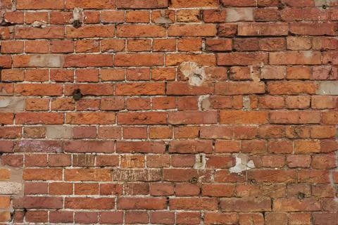 Old brick wall. Brickwork from an old brick in a rustic style. The structure and Stock Photos