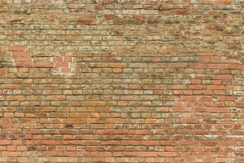 Old brick wall. Brickwork from an old brick in a rustic style. The structure and Stock Photos