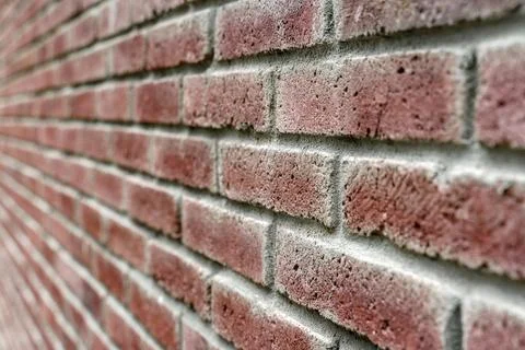 Old brick wall. Brickwork from an old brick in a rustic style. The structure and Фото
