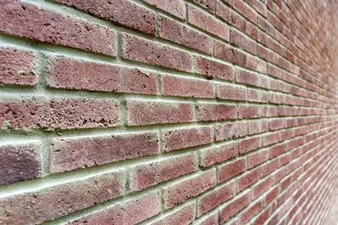 Old brick wall. Brickwork from an old brick in a rustic style. The structure and Stock Photos