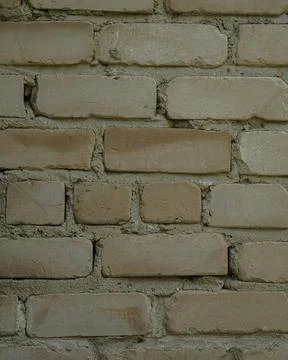 Old brick wall close-up. Background image with brick texture. Stock Photos