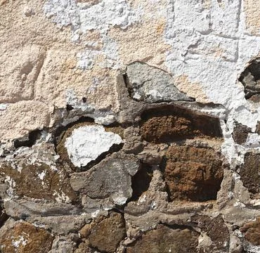 Old brick wall with damaged plaster. Close up Texture Stock-Fotos