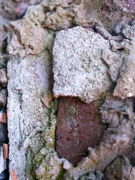 Old Brick Wall With Damaged Plaster Texture Close Up Foto stock