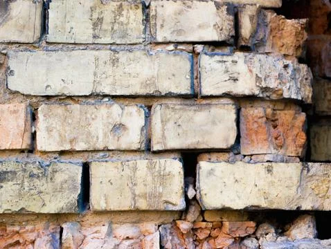 Old brick wall. Front close-up view of a old brick wall Stock Photos