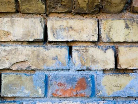 Old brick wall. Front close-up view of an old brick wall. beige painted with  Foto stock