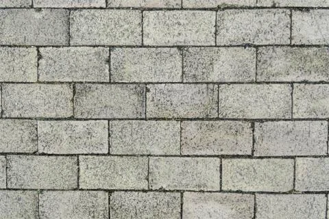 Old brick wall gray gray background. Stock Photos
