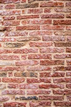 Old brick wall, old texture of red stone blocks Stock Photos