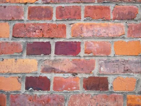 Old brick wall, old texture of red stone blocks closeup Stock Photos