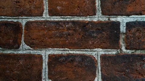 Old brick wall, old texture of red stone blocks closeup Stock Photos
