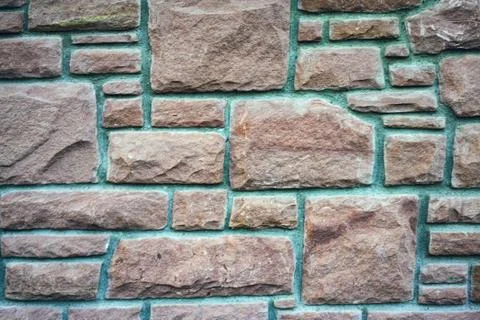 Old brick wall, old texture of red stone blocks closeup high Stock Photos