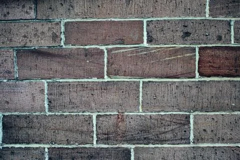 Old brick wall, old texture of red stone blocks closeup Foto stock