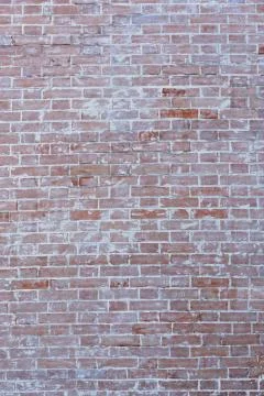 Old brick wall, old texture of red stone blocks closeup Stock Photos