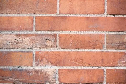 Old brick wall, old texture of red stone blocks closeup Stock Photos