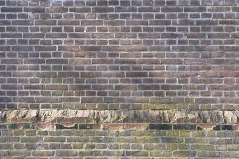 Old brick wall, old texture of red grey stone blocks Stock Photos