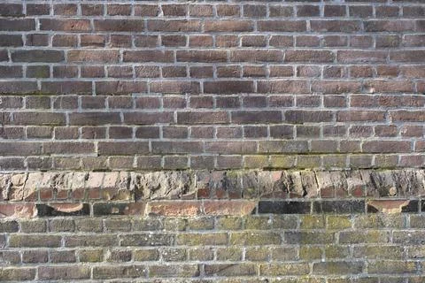 Old brick wall, old texture of red grey stone blocks Stock Photos