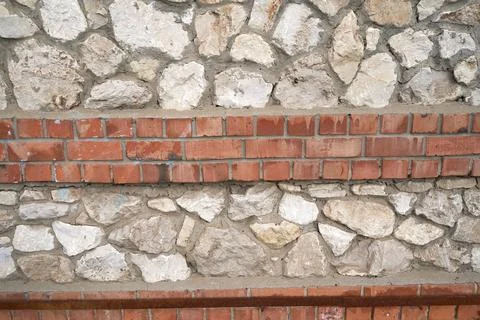 Old brick wall, old texture of stone blocks closeup Stock Photos