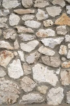 Old brick wall, old texture of stone blocks closeup Stock Photos