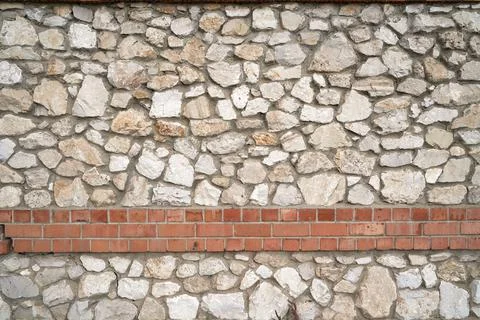 Old brick wall, old texture of stone blocks closeup Foto stock