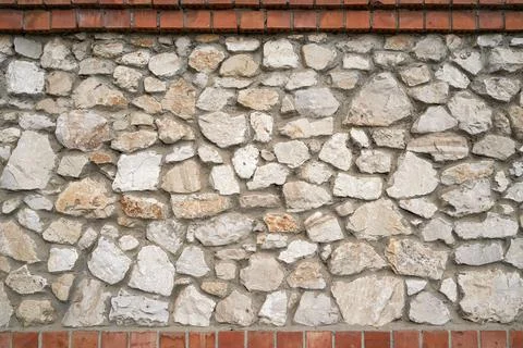 Old brick wall, old texture of stone blocks closeup Stock Photos